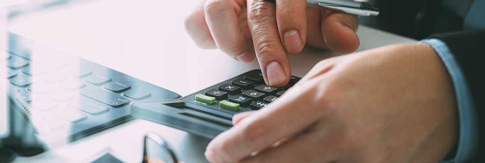 close up of businessman hand working with finances about cost